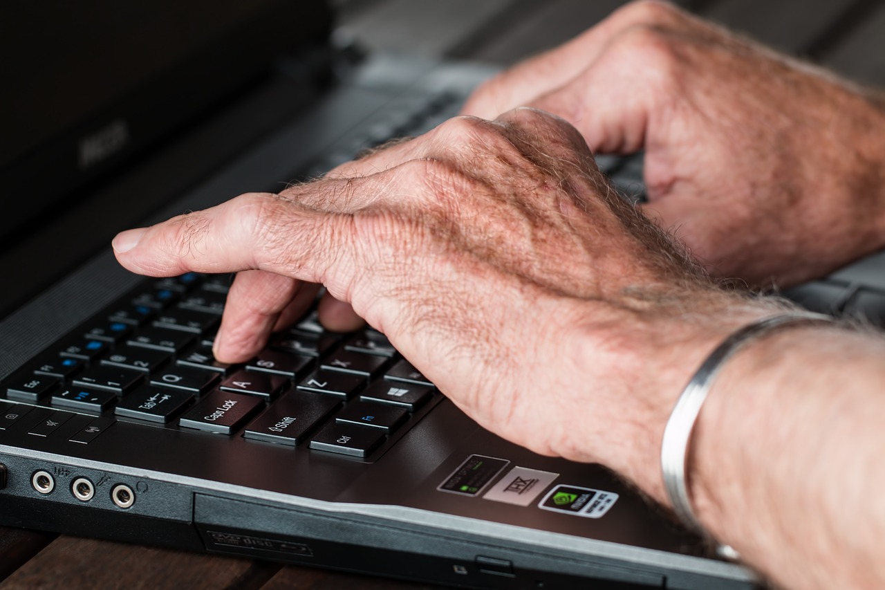 typing on a keyboard at Coro - creating a risk response plan