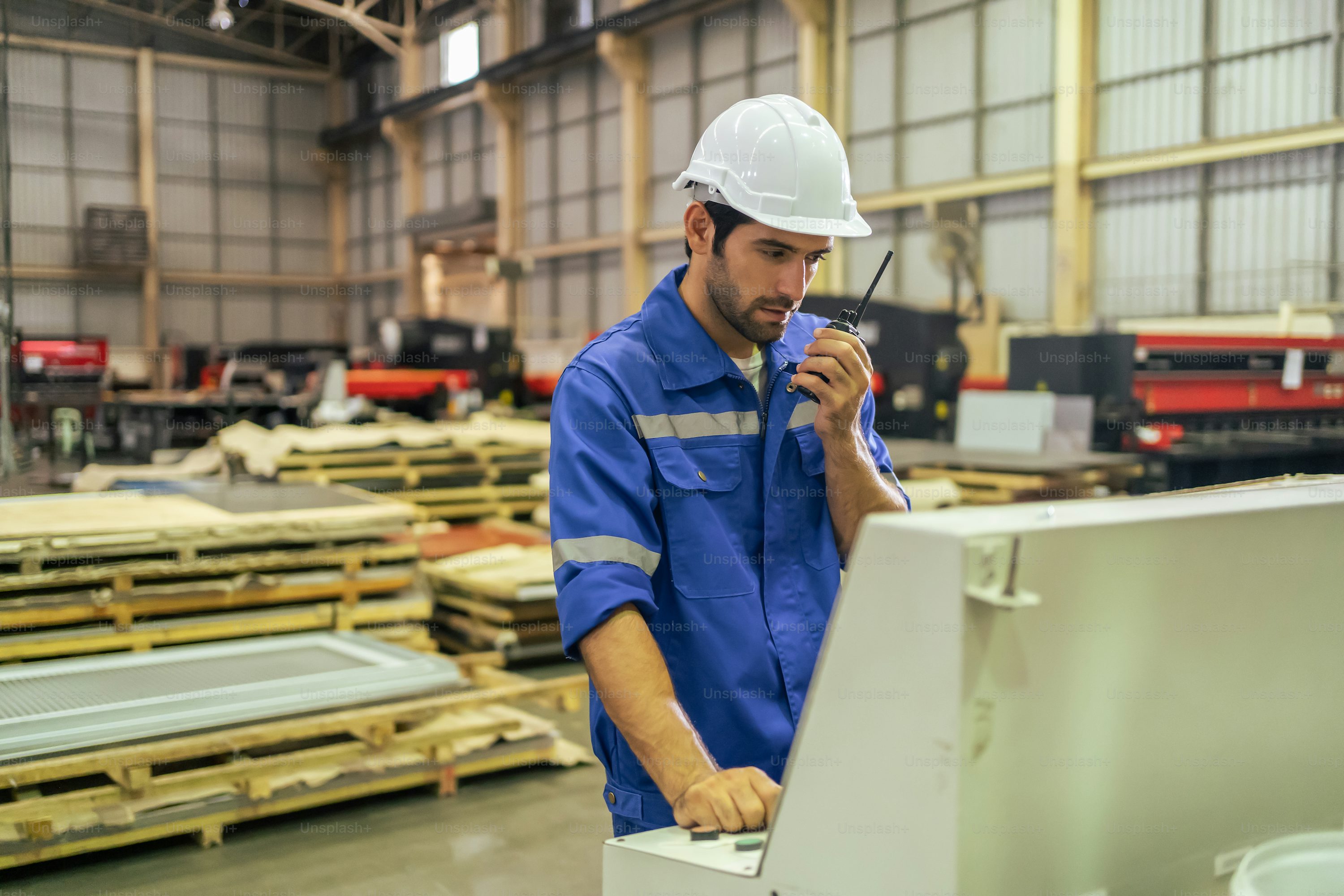 Factory worker initiating iot device control